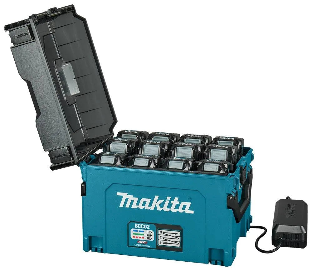 Makita toolbox with multiple battery packs and charger on a white background